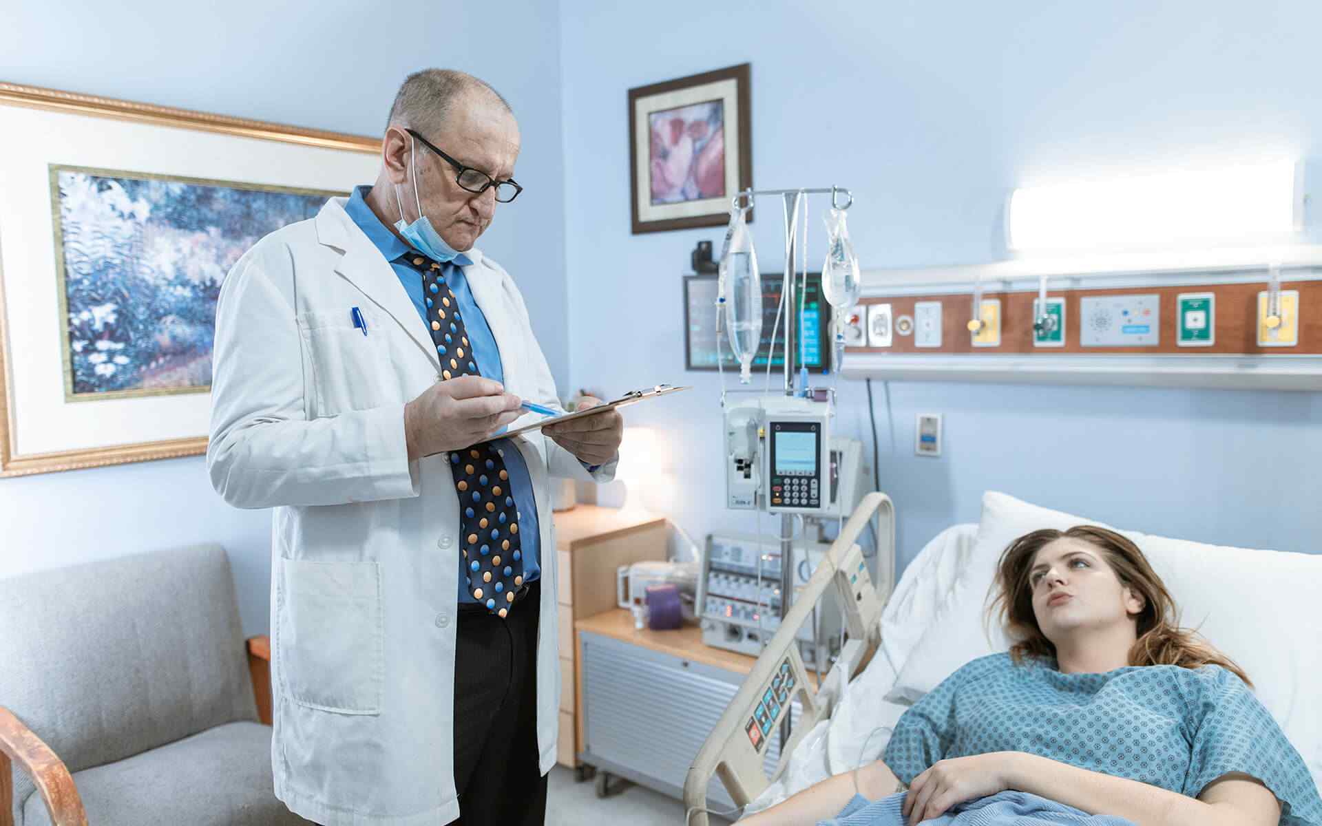 doctor observing patient